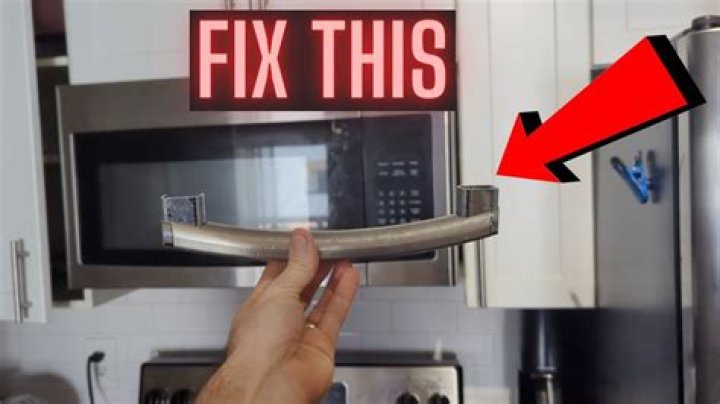 How do I fix the handle on my Whirlpool microwave?